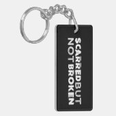 Geschrammtes aber nicht gebrochenes schlüsselanhänger (Vorderseite links)