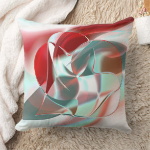 Geschweißte, kreisförmige Stücke in weichem rotem Kissen