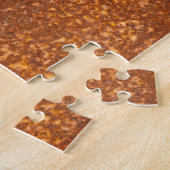 Geschweißtes altes Metall, Roststruktur. Puzzle (Seite)