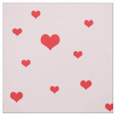 Gespeicherte rote Herzen auf hellrosa Farbe Stoff (Muster)