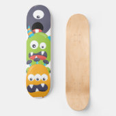 Gestapelte Monster Orange Green Black Kids Skateboard (Vorderseite)