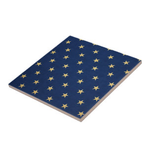 Gestickte goldene Sterne auf blauem Denim Fliese