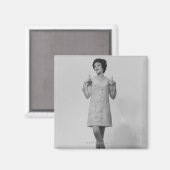 Gestur der Frau Magnet (Vorderseite/Rückseite)