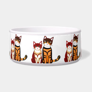 Getigerte Katze und roter Kater Napf