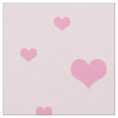 Getrennte rosa Herzen auf hellrosa Stoff (Nahaufnahme)