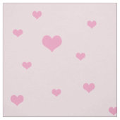 Getrennte rosa Herzen auf hellrosa Stoff (Muster)