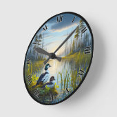 Gewohnte Goldeneye-Enten bei Sunset Roun Runde Wanduhr (Winkel)