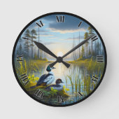 Gewohnte Goldeneye-Enten bei Sunset Roun Runde Wanduhr (Vorderseite)