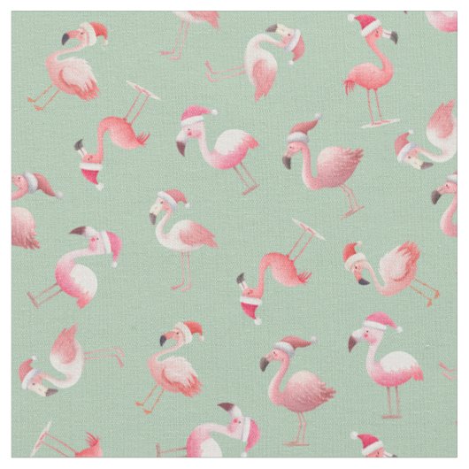 Geworfene Weihnachtsflamingos auf Hellgrün Stoff (Nahaufnahme)