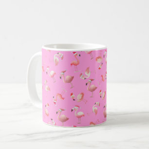 Geworfene Weihnachtsflamingos auf Rosa Kaffeetasse