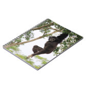 Gibbon schwingt von Baum Notizblock (Linke Seite)