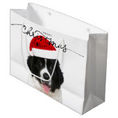 GIFT BAG ST BERNARD PUPPING MIT WEIHNACHTSMANNMÜTZ GROßE GESCHENKTÜTE (Vorderseite Schrägansicht)
