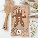 Gingerbread Man Brown Monogram Frohe Weihnachten Geschirrtuch<br><div class="desc">Feiern Sie die Feriensaison mit diesem maßgeschneiderten Lebkuchen Mann Merry Weihnachtsküche Handtuch. Mit einem niedlichen Lebkuchenmann mit roter Bogen-Krawatte, einem festlichen "Frohen Weihnachten"-Gruß und einem personalisierten Monogramm auf braunem Hintergrund verleiht dieses Handtuch Ihrer Küchendekoration eine fröhliche und festliche Touch. Ideal, um Ihrer Zuhause eine personalisierte Touch zu verleihen oder hinzuzufügen....</div>