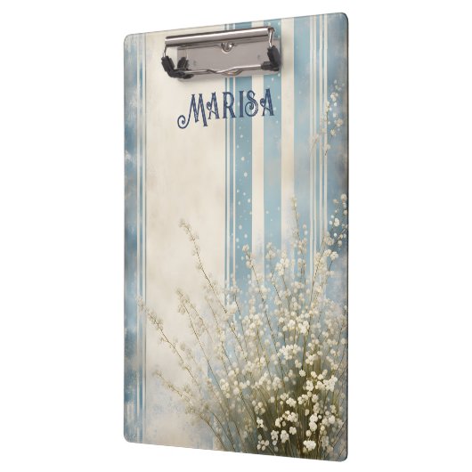 Gipskraut auf verblassten blauen Streifen Klemmbrett (Links)