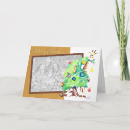 Giraffe, die Weihnachtsbaum isst Feiertagskarte