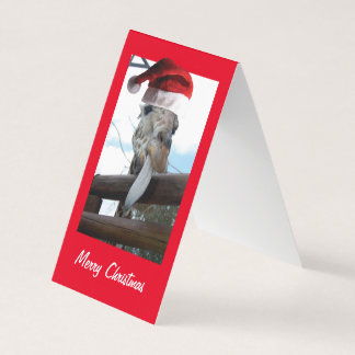 Giraffe mit einem Weihnachtshut