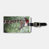 Giraffe mit einem Weihnachtshut auf Gepäckanhänger (Vorderseite horizontal)