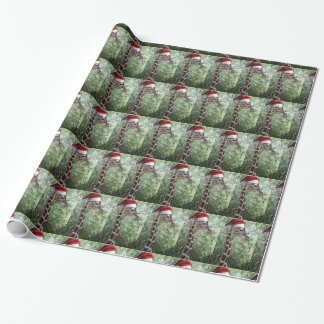 Giraffe mit einem Weihnachtshut Geschenkpapier