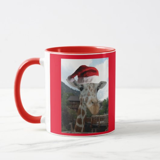 Giraffe mit einem Weihnachtshut Tasse (Links)