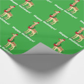 Giraffe mit Weihnachtsmannmütze und Geschenkpapier (Ecke)