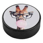 Giraffe wearing glasses blowing a pink bubble gum eishockey puck (3/4)