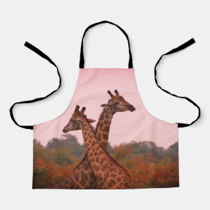 Giraffen mit einem rosa Himmel Schürze