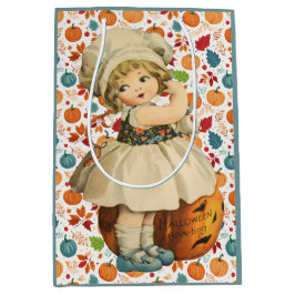 Girl Carving Apple und farbenfrohe Pumpkins Hallow Mittlere Geschenktüte