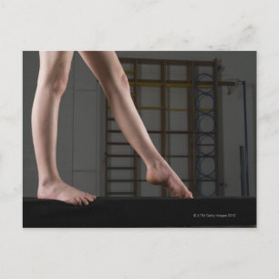 Girl walking on balance beam postkarte