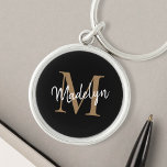 Girly Black Gold Monogram Name Elegantes Chic Scri Schlüsselanhänger<br><div class="desc">Girly Black Monogram Name Elegant Chic Script Schlüsselanhänger. Dieses moderne,  elegante Schlüsselanhänger mit Ihrem individuellen Monogramm und Namen ist einfach zu personalisieren.</div>