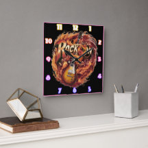 Gitarre in Flammen mit Noten bei Dämmerung