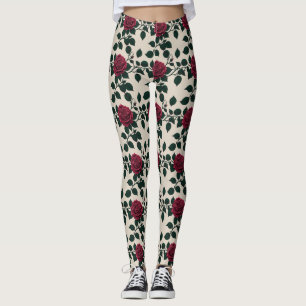 Glänzende karmesinrote Rosen mit dunkelgrünen Blät Leggings