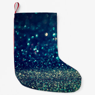 glänzender Vintage-Lichterhintergrund. Gold, Silbe Kleiner Weihnachtsstrumpf