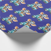 Glänzendes Geschenkpapier Blaues Elefantenscooter (Ecke)