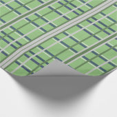 Glänzendes grün kariertes Geschenkpapier (Ecke)