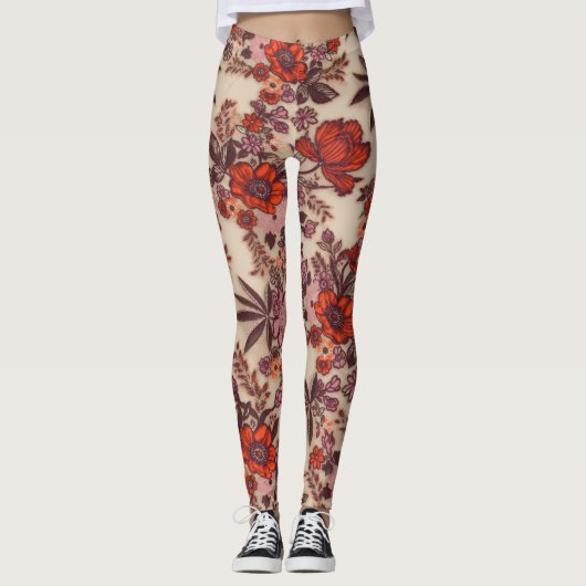 Glänzendes orangefarbenes Blumenstickereimuster au Leggings (Vorderseite)