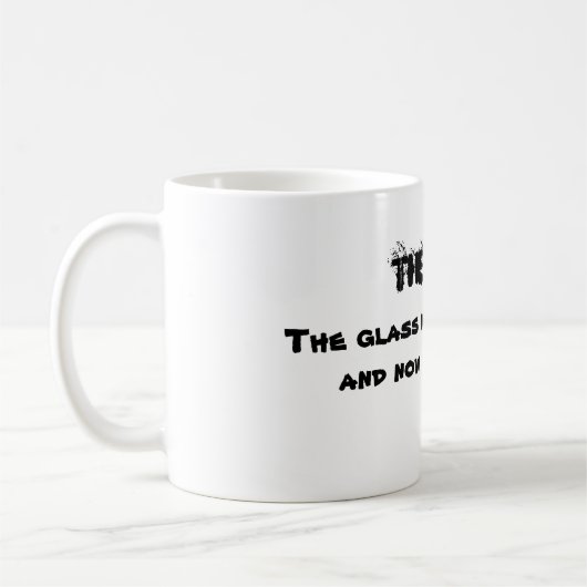 Glas halb leer - die Katze Kaffeetasse (Links)