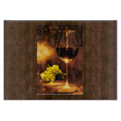 Glas Wein und grüne Trauben durch Kerzenlicht Schneidebrett (Vorderseite)