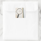 Gläserndes Buch mit Insekten Quadratischer Aufkleber (Tasche)