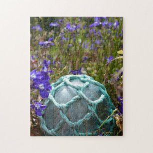 Glasfischerboje und Blumen Puzzle