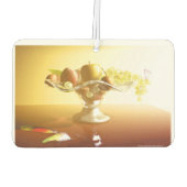 Glaskorb mit Früchten und Batterie Autolufterfrischer (Rückseite)