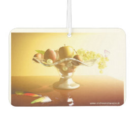 Glaskorb mit Früchten und Batterie Autolufterfrischer