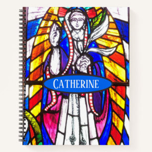 Glasmalerei-Design mit religiöser Figur. Notizblock