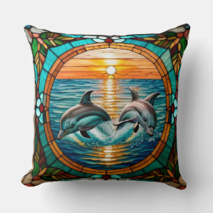 Glasmalerei mit Delfinen, die bei Sonnenuntergang Kissen