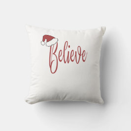 Glaube an Weihnachten mit roter Weihnachtsmannmütz Kissen