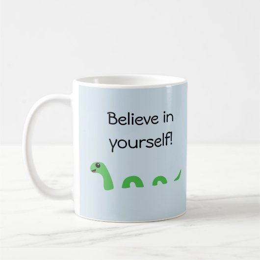 Glauben Sie an Ihren eigenen Cartoon Loch Ness Mon Kaffeetasse (Links)