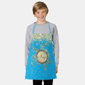 Glitterie-Goldschildkröte auf blauer Schürze (Getragen)