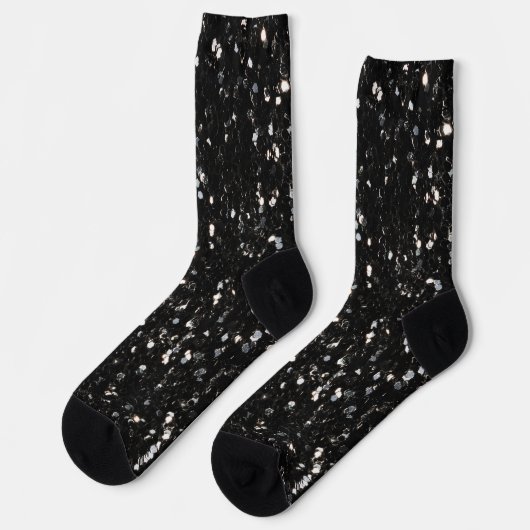 Glitzern aus schwarz-weiß glänzenden Glitzer Socken (Linkes Detail)