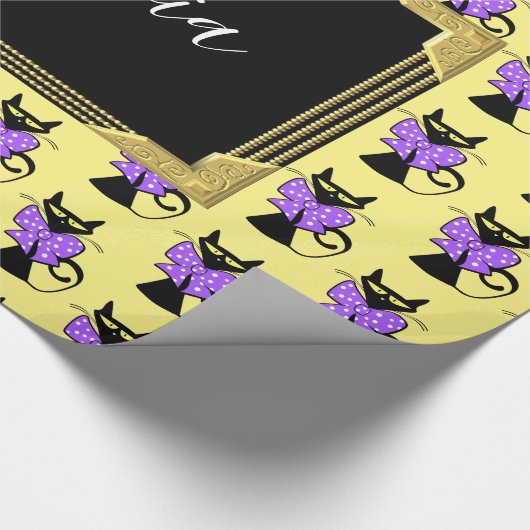 Glosswackelpapier, Monogramm der gelben schwarzen  Geschenkpapier (Ecke)