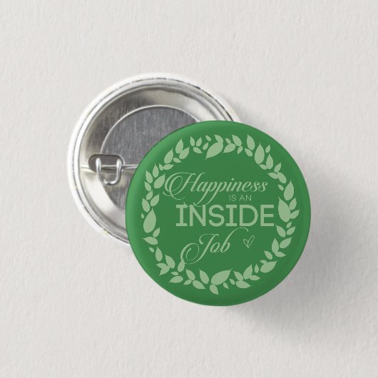 Glück ist ein grüner Kranz-Knopf im Inneren eines Button (Vorne & Hinten)