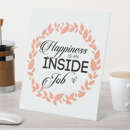 Glück ist ein innerer Arbeitskampf Sockelschild (In Situ)